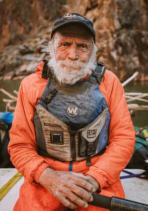A photo of Nels Niemi, former guide, decked out and on a river. 