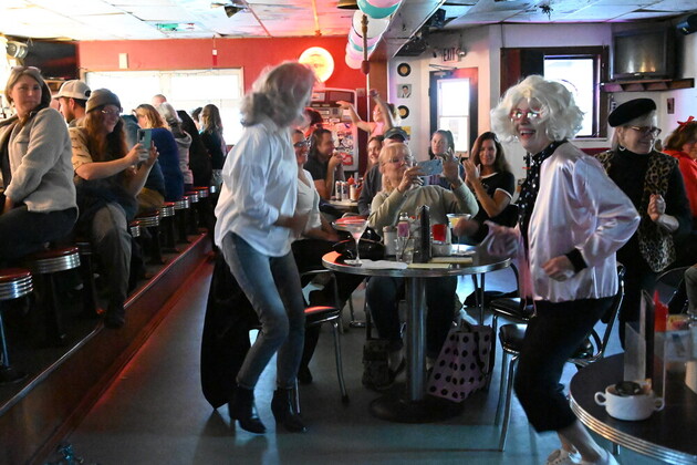 (right) Christy Tengs Fowler dances during the 70-year anniversary of the Bamboo Room and Pioneer Bar, which Fowler has owned since the 90s. (Photo by Lex Treinen/Chilkat Valley News) 